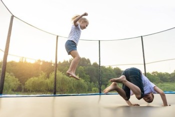 Kids jumping on trampoline